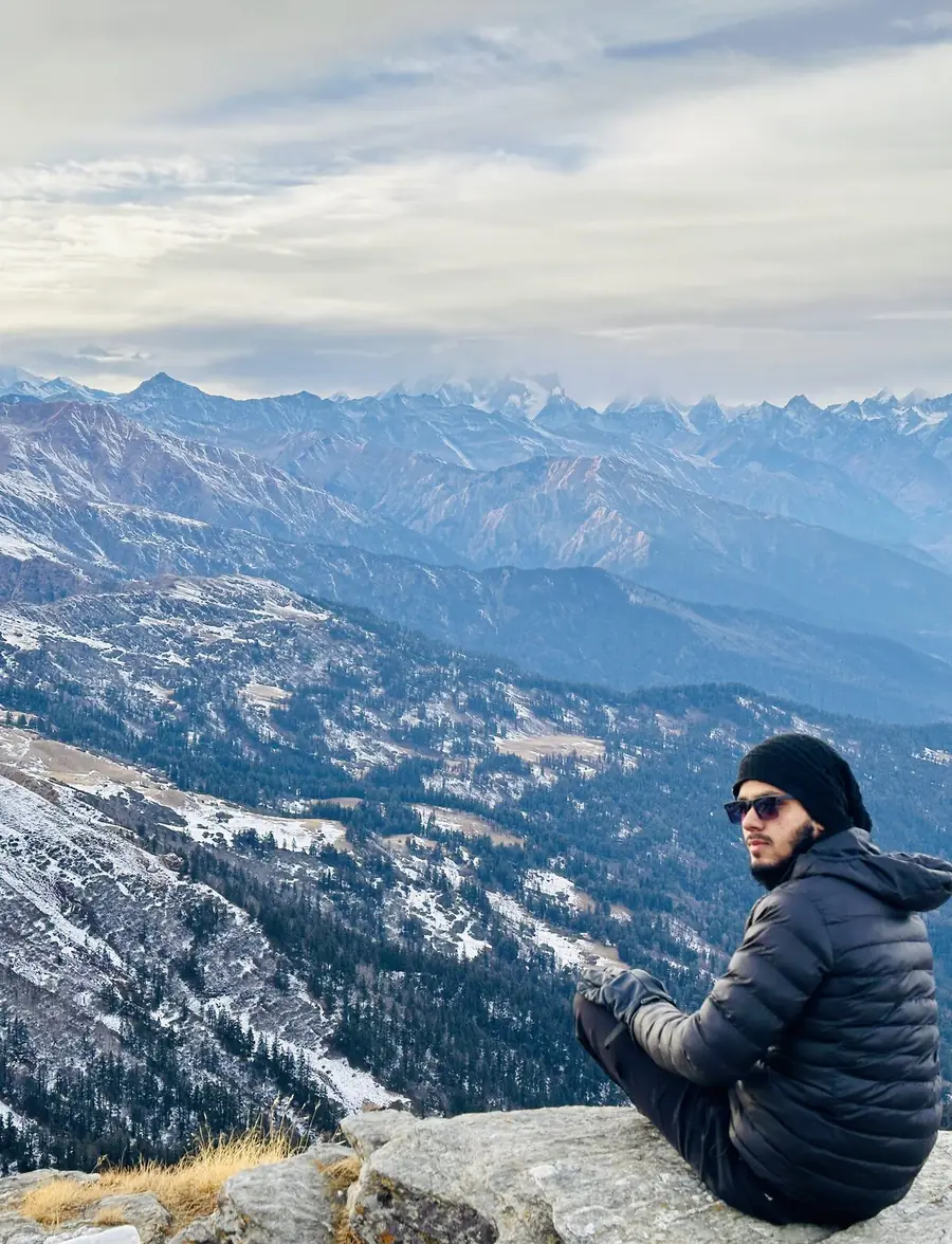 Maaz Khan looking out over a Himalayan valley